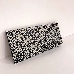 BLACK AND IVORY BEADED CLUTCH